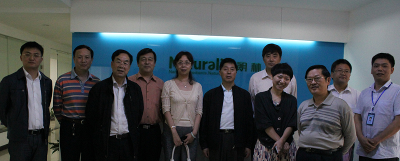 Officials visit Naturalin headquarters